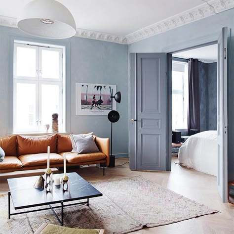 A Norwegian home tour: sitting room with light blue walls and cognac leather sofa. Photo Yvonne Wilhelmsen interior Tone Kroken Light Blue Living Room, Norwegian Home, Blue Walls Living Room, Studio Floor Lamp, Light Blue Walls, Beautiful Sofas, Blue Living Room, Blue Rooms, Scandinavian Home