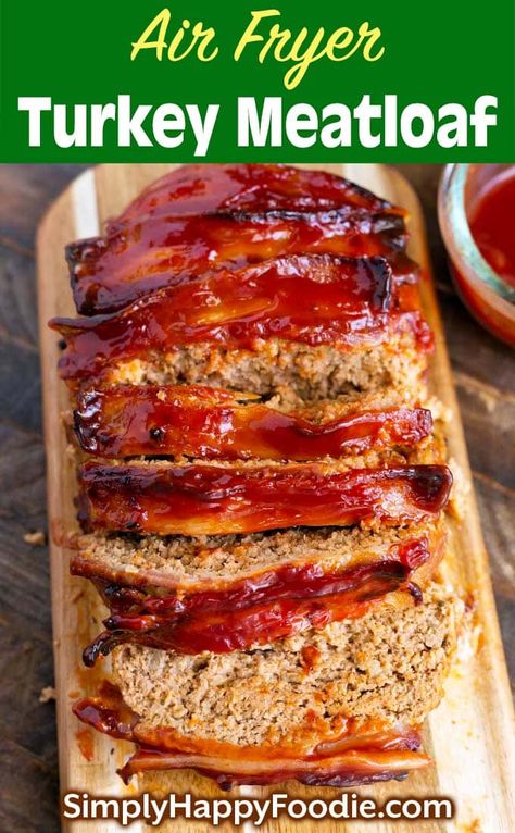 Air Fryer Turkey Meatloaf comes out flavorful and moist, with a delicious topping to go over it. This is a turkey meatloaf recipe that the whole family will like. Easy Air fried turkey meatloaf is done in under an hour! simplyhappyfoodie.com #turkeymeatloaf #airfryerturkeymeatloaf #healthyairfryer Air Fryer Turkey Meatloaf, Turkey Loaf, Ground Turkey Meatloaf, Air Fryer Turkey, Tartiflette Recipe, Bacon Wrapped Meatloaf, Minced Beef Recipes, Turkey Meatloaf Recipes, Fried Turkey