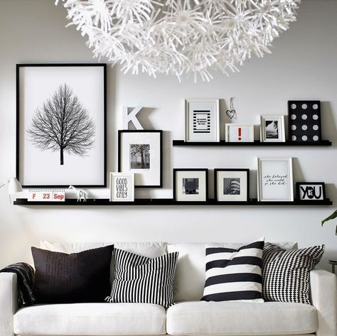 Wall Decor Black Picture Shelves, Front Room Wall Decor Ideas, Photo Shelves Display, Picture Shelf Living Room, Over The Couch Wall Decor, Wall Art Shelf, Long Shelves, Black And White Wall Decor, Photo Shelf