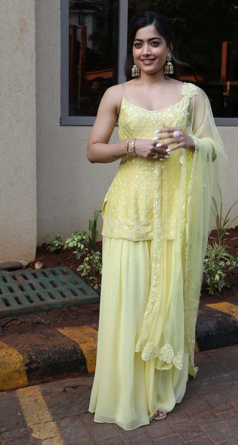 rashmika mandanna in a yellow sharara for goodbye promotions Rashmika Mandana Indian Outfits, Yellow Dresses Indian, Rashmika Mandana Traditional, Rashmika Mandana Outfits, Hairstyles For Sharara Dress, Yellow Indian Outfit, Yellow Salwar Suit, India Core, Indo Western Outfits For Women