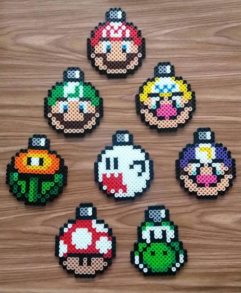 Green Bay Perler Beads, Christmas Ornament Perler Bead Patterns, Super Mario Brothers Perler Beads, Fuse Bead Christmas Ornaments, Nintendo Christmas Art, Perler Bead Super Mario, Standing Perler Bead Patterns, Diy Mario Ornaments, Christmas Mario Perler Beads