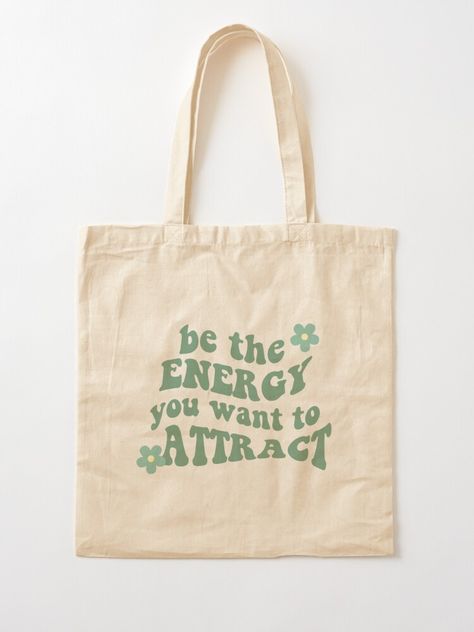 be the energy you want to attract aesthetic tote bag tags: energy, manifest, attract, be the energy you want to attract, aesthetic, aesthetic bag, aesthetic tote bag, aesthetic tote bags, back to school, back to school aesthetic, tote bags, tote bags, ootd, outfit inspo, hippie, preppy Totes Ideas Aesthetic, Cute Tote Bags For School, Attract Aesthetic, Custom Tote Bag Aesthetic, Tote Bag Design Ideas Aesthetic, Aesthetic Totes, Tote Bag Aesthetic Outfit, Bags Drawing, Expensive Purses