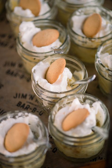 Backyard wedding BBQ dessert served in mini mason jars was the perfect sweet finish to this casual wedding reception Backyard Wedding Bbq, Rehearsal Dinner Dessert Ideas, Lake House Wedding Reception, Backyard Wedding Reception Food, Southern Wedding Food, Engagement Party Desserts, Potluck Wedding, Bonfire Wedding, Casual Wedding Reception