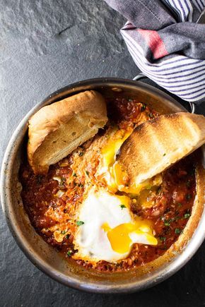 Eggs in Purgatory | girlgonegourmet.com via @april7116 Eggs In Purgatory, Best Egg Recipes, Avocado Breakfast, Toasted Bread, Poached Egg, Easy Dishes, Sheet Pan Recipes, Salsa Verde, Poached Eggs