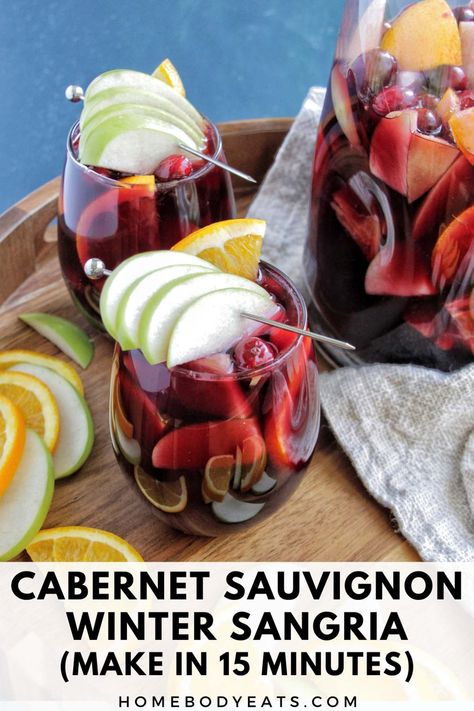 This red wine cabernet sauvignon sangria recipe is simple and full of delicious flavors. With hints of apple cider, orange, and cranberry, this sangria would be perfect for any fall or winter celebrations (Thanksgiving, Christmas, or holiday party). Add in a splash of brandy for an extra kick of warmth. This is the best easy cocktail for a crowd! Cabernet Sauvignon Sangria, Holiday Cocktails Thanksgiving, Cocktail For A Crowd, Winter Sangria Recipes, Wine Thanksgiving, Christmas Sangria Recipes, Thanksgiving Sangria, Sangria Pitcher, Orange And Cranberry