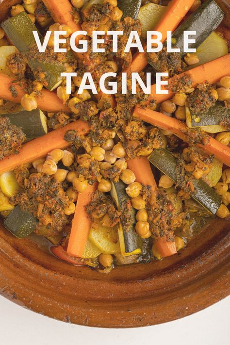 This Moroccan Vegetable Tagine is the perfect stew for the colder months, loaded with warm spices and hearty veggies. Served over a bed of couscous or with warm bread, this flavorful vegan meal is bound to warm up the entire family! Vegetable Tagine, Beef Tagine, Moroccan Seasoning, Tagine Cooking, Moroccan Vegetables, Vegetable Couscous, Tagine Recipes, Moroccan Dishes, Potato Vegetable