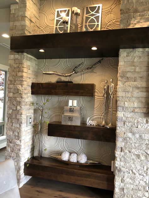 Shelves On Stone Wall, Stone Partition Wall Design, Living Room Designs Stone Wall, Living Room Tv Wall Stone, Stone Wall Interior Living Room Floating Shelves, Stone Wall Cladding Interior, Stone Piller Design Columns, Wall Cladding Interior, Living Room Big