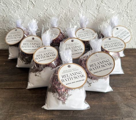 These are the perfect way to treat yourself at the end of the day! Each herbal tea bath comes in a reusable organza bag filled with ethically and/or organically sourced dried herbs and salts. Hang herb mixture on faucet and let hot water run through or just toss into your bath and let steep while you relax and soak up the natural properties. Each bag weighs approx 5oz. Herbal benefits: Epsom salt- is actually magnesium sulfate and is a natural exfoliant and anti-inflammatory. Commonly used to tr Bath Tea Packaging Ideas, Bath Salt Tea Bags, Healing Baths, Sore Muscles Bath Soak, Sea Salt Cleanse, Witch Bath, Herbal Bath Soak, Salt Cleanse, Herbal Benefits