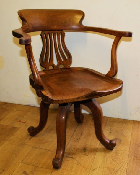 Stunning and highly authentic late Victorian captains revolving desk chair, made from mahogany. The chair has lovely classical back rest and charming curved seat and legs, the chair is of the highest standard and would stand out in any setting.  ... Office Antique, Industrial Seating, Captains Chair, Retro Armchair, Chair Wooden, 3d Environment, Desk Office, Wooden Desk, Armchair Vintage