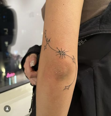 Star Arm Wrap Tattoo, Star Inspired Tattoo, Abstract Wrist Tattoo, Abstract Shape Tattoo, Ornamental Wrap Around Tattoo, Symmetrical Wrist Tattoo, Fine Line Filler Tattoo Ideas Gap, Dainty Elbow Tattoo, Colored Line Tattoo