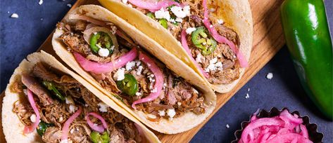 Elevate your next taco night with these quick carnitas! Our house-smoked pulled pork mingles with a luscious sauce and is topped with pickled red onions, a sprinkling of cheese, and fresh jalapeños. Homemade Gyros, Best Trader Joes Products, Trader Joes Food, Greek Gyros, Greek Dinners, Trader Joes Recipes, Easy Eat, Dinner Options, Trader Joe’s