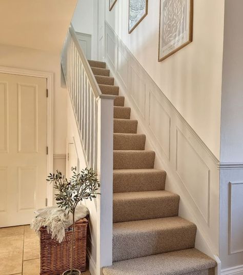 Choose Malabar Two-Fold in Llama to achieve a picture perfect staircase that is bright and welcoming. Image by @journeyat_number30 on Instagram. Stairs Paneling Stairways, Cosy Staircase, Stairway Paneling, Neutral Hallway, Stairs And Hallway Ideas, Stair Basket, Stair Paneling, Carpet Staircase, Stairway Decorating