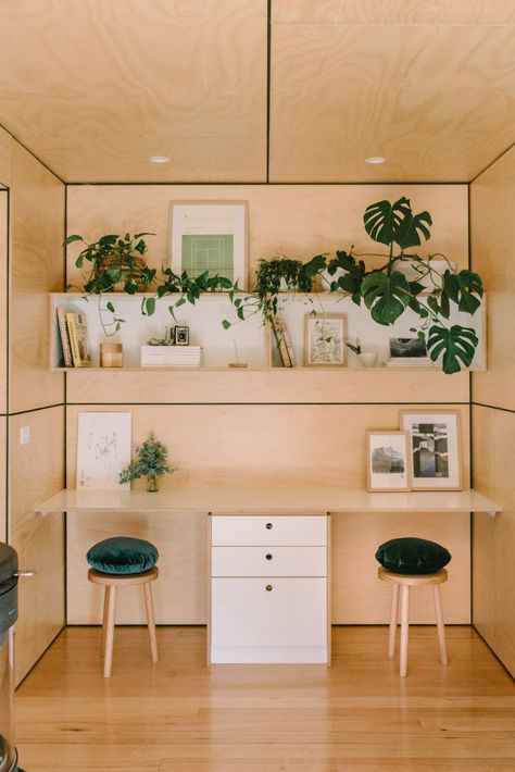 Photo 7 of 12 in Three Shipping Containers Form a Tiny, Eco-Friendly Home in Australia - Dwell Bush House, Converted Shipping Containers, Shed Office, Plywood Projects, Light Hardwood, Light Hardwood Floors, Shipping Container Home, Desk In Living Room, Eco Friendly Home