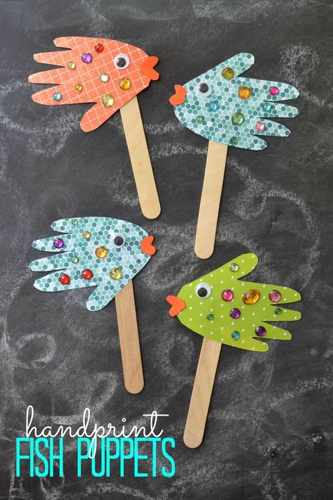 Easy Kids Craft: Handprint Fish Puppets | Happy Crafting | Blitsy Submerged Vbs Crafts, Fish Puppets, Handprint Fish, Ocean Kids Crafts, Afternoon Crafts, Kerajinan Diy, Art Projects For Adults, Fish Crafts, Vbs Crafts