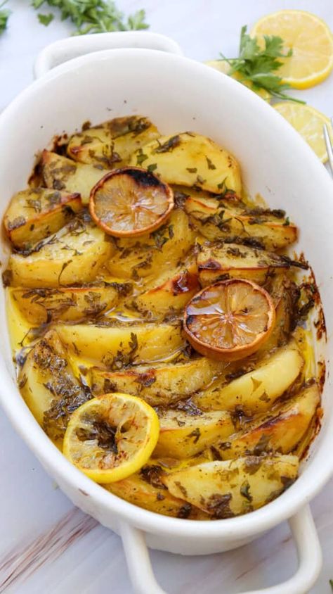 Greek Lemon Potatoes are perfectly roasted in a lemon, oregano, and garlic broth resulting in a tender, flavorful side dish. This easy potato recipe is a delicious side dish that adds a Mediterranean twist to any meal. Lemon Greek Potatoes, Greek Side Dishes, Garlic Broth, Greek Roasted Potatoes, Cookie Mix In A Jar, Lemon Roasted Potatoes, Greek Lemon Potatoes, Mix In A Jar, Greek Recipe