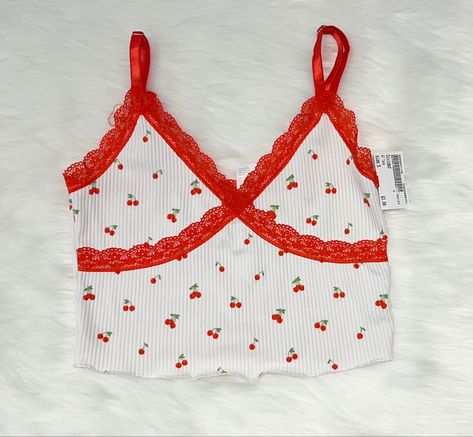 Coquette Lana Del Ray white crop top with cherry pattern & red lace lining Cherry Crop Top, Cherry Pattern Clothes, Red Camisole, Cami Outfit, Red Crop Top, Spaghetti Strap Top, Casas The Sims 4, Cherry On Top, Cropped Cami