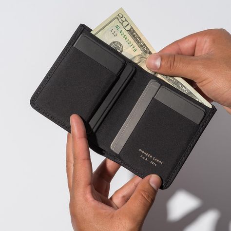 The modern all-rounder billfold wallet with a clean vertical layout. Holds all currencies for seamless international travel while maintaining a slim profile using our durable performance fabrics. Designer's note: The Euro and Yen fit right in, in this one-size-fits-all wallet that's a best-seller for a reason. The Altitude has been refined through the years to become an extremely durable and refined choice for those who want it all. For more card slots try the Division. For less card slots try t Cash Wallet, Modern Packaging, Onyx Colour, Forest Color, Background Wallpaper For Photoshop, Pocket Organizer, Billfold Wallet, The Division, Passport Wallet