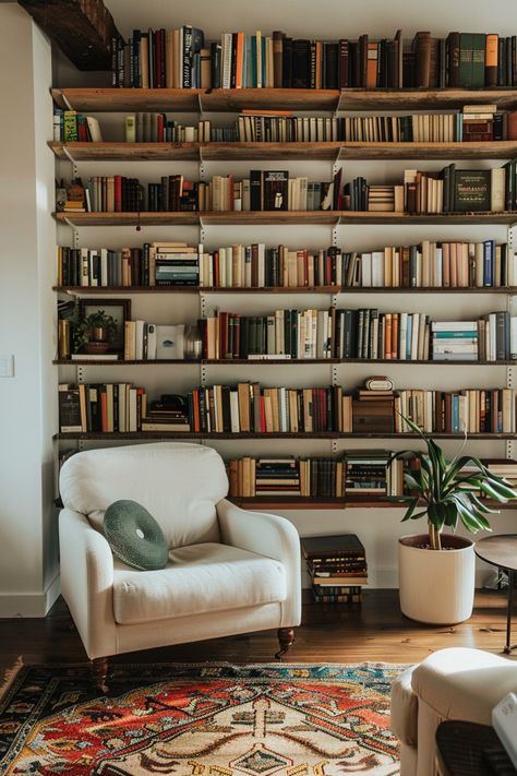 Modernize Your Home Library: Sleek Shelving Unit Designs - Quiet Minimal #zicxa-photos #zicxa #images #background #wallpaper #freepik #shutterstock #VN Check more at Book Shelves Built In, Living Room Bibliotheque, Library Home Design, Library Shelf Ideas, Home Library Shelves, Book Floating Shelves, Wall Of Floating Shelves, Big Book Shelf, Maximalist Bookshelf