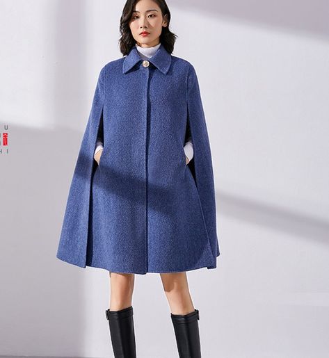 Product Description: The double face cashmere coat made with handmade ,very high grade fabric cashmere fabric. Material:cashmere80%- 90% wool 10%-15% Size for the garments: XS: Length:88cm/34.6" waist belt:92cm/36.2"" S: Length:91cm/ 35.8" waist belt:96cm/37.8" M: Length 92cm/36.2" waist belt:100cm/39.4" L: Length:93 cm/36.6" waist belt:104cm/40.9" XL: Length:94cm/37.0" waist belt:108cm/42.5" Payment: We accept payment by paypal and credit card. if you would like to pay by credit card, please ch Cape Coat Pattern, Belted Cape Coat, Mantel Cape, Coat Cape, Wool Cape Coat, Cape Cloak, Cashmere Fabric, Wool Cape, Cape Coat