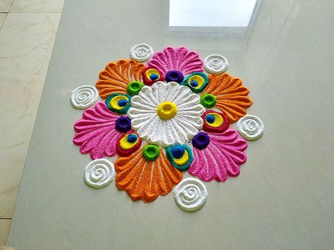 Rangoli For Holi, Steps Rangoli Designs, Gauri Rangoli, Rangoli Aesthetic, Colourful Rangoli Designs, Aesthetic Rangoli, Holi Rangoli, Feather String Art, Easy Rangoli Designs Videos