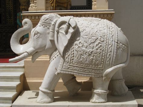 A elephant, beautifully hand carved out of white marble at a local stone mason's store in Jaipur, India. Marble Elephant, Elephant Home Decor, Elephant Carving, Wooden Front Door Design, Boho Art Drawings, Entrance Gates Design, Sculpture Art Clay, Peace Illustration, Indian Sculpture