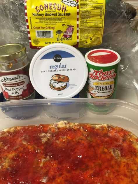 Conecuh Saugage Dip Good for a crowd Only 4 ingredients to mix together Plus you will need either French or Italian bread or cracker to spread dip. 1. Conecuh sausage 1 package 2. Cream Cheese 1 8oz package 3. Tony's Chachere's Creole seasoning 4. Red Pepper Jelly Cut sausage into small pieces and fry till cooked add cream cheese till melted and season with Tony Chachere's creole seasoning mix together and pour into a glass pan. spread Red Pepper jelly over the mixture and enjoy. Slice bread #pa Conecuh Sausage Recipes Appetizers, Conecuh Sausage Recipes, Gametime Food, Jelly Appetizers, Beachy Food, Good For A Crowd, Conecuh Sausage, 2024 Diet, Sausage Appetizer Recipes