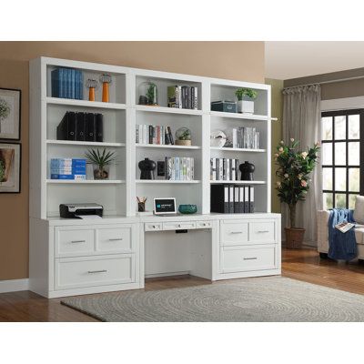 This 94.5'' bookcase and writing desk combo offers a classic touch to your home office or study space. The frame is made from a blend of solid and engineered wood, featuring adjustable shelves that are just right for housing your favorite reads or decorative items. Its many shelves provide ample support for your belongings. At the center, an integrated writing desk gives you a dedicated spot to work or study. Best of all, this 120'' wide piece comes with a wall anchor for security. | Lark Manor™ Library Desk, Office Bookshelves, Office Built Ins, Home Office Library, Library Wall, Bookcase Wall, Reading Nooks, Desk Ideas, Study Design