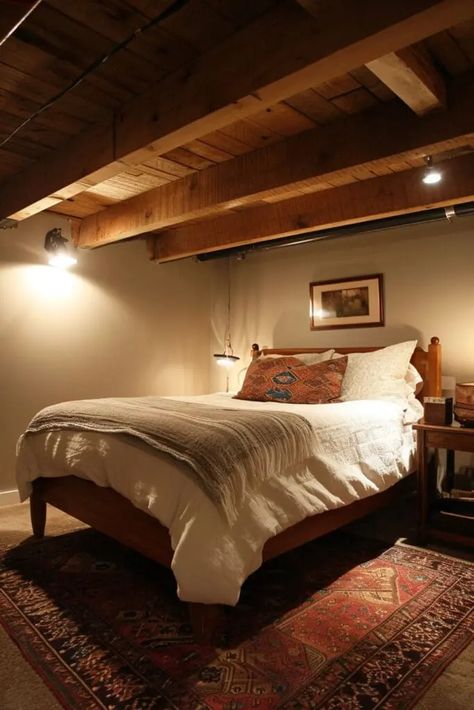 Converting an unfinished basement into a bedroom can provide extra space and add value to your home. It might seem daunting, but with some planning and creativity, you can transform the often-overlooked area into a cozy and inviting retreat. Here are 25 Transformative Unfinished Basement Bedroom Ideas. Rustic Basement Bedroom Ideas, How To Make A Basement Bedroom Cozy, Temporary Basement Bedroom, Bedroom No Windows Ideas, Basement Bedroom Layout Ideas, Basement Bedroom No Windows, Cozy Unfinished Basement, Unfinished Basement Ideas On A Budget, Basement Master Suite Ideas