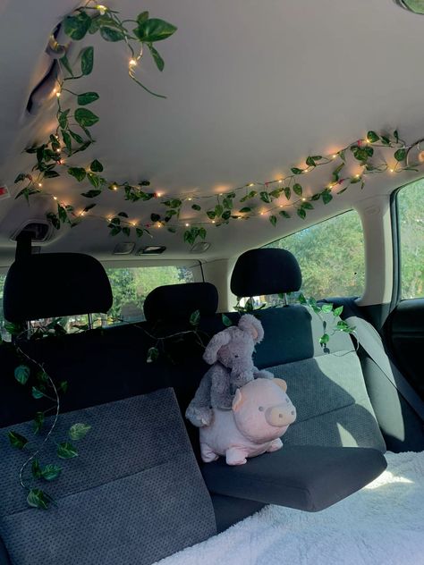 my car + vines = home 💚 -  #Car #home #Vines Car House Design, Dream Car Interior Aesthetic, Nature Themed Car Interior, Car Decor Theme, Inside Truck Aesthetic, Car Seat Decor, Car Dash Painting Ideas, Cute Car Sun Shade, Fairy Lights In Car