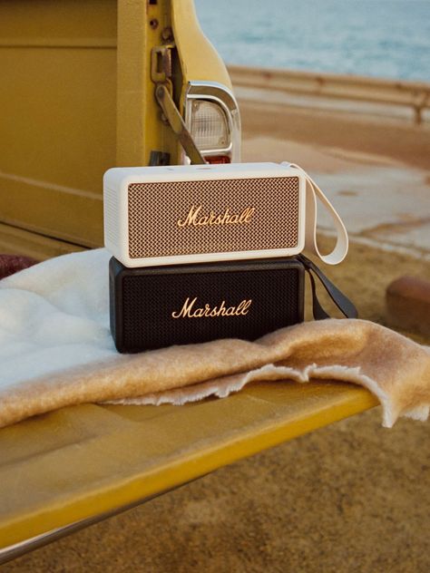 Marshall amplifiers are iconic; a British brand that epitomises powerful, high-quality sound and the spirit of rock'n'roll. Their range of speakers are designed with the same attention to audio excellence, and brings the cool prestige of this classic company into the home. Middleton Carry the loud sound of Marshall in your hand, at home, or outdoors. The Middleton holds a hefty 20 hours of playtime, while tough-as-nails build quality makes it ready for anything. Connect multiple Bluetooth device Marshall Speaker Aesthetic, Marshall Logo, Speaker Marshall, White Marshall Speaker, Marshall Bluetooth Speaker, Marshall Bluetooth, Bose Bluetooth Speaker, Vintage Marshall Amp, Marshall Guitar Amp