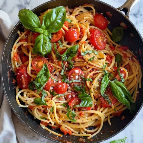 Recipe: Summertime Freshness in Every Bite - Tomato Basil Pasta Indulge in the flavors of summer with this easy-to-make, light, and refreshing Tomato Basil Pasta dish. It's the perfect weeknight meal or a delightful addition to your brunch or lunch spread. The burst of fresh basil and juicy tomatoes will transport your taste buds to a sun-kissed Italian villa, all in the comfort of your own kitchen. Ingredients: 1 pound pasta of your choice (spaghetti, penne, or fusilli recommended) 2 table... Lunch Spread, Tomato Basil Pasta, Kitchen Ingredients, Basil Pasta, Juicy Tomatoes, Italian Villa, Pasta Dish, Tomato Basil, Fresh Basil