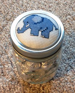 Mason Jar Tutorial | The Stitching Corner Mason Jar Cross Stitch Pattern, Mason Jar Frog Lids, Cross Stitch Mason Jar Lids, Cross Stitch Jar Lids, Christmas Cross Stitch Mason Jar Lids, Mason Jar Sewing Kit, Small Jam Jars, Small Elephant, When You Are Happy