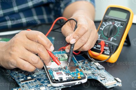 Technician repairing inside of mobile phone by soldering iron. Integrated Circuit. the concept of data, hardware, technology. Learn Car Driving, Electronic Technician, Macbook Repair, Integrated Circuit, Cell Phone Screen, Cell Phone Repair, Laptop Repair, Mobile Phone Repair, Samsung Device