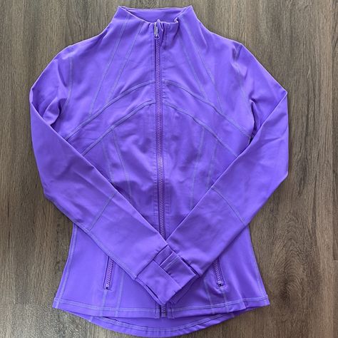 Whether You Are Working Out Or On The Go, Our Premium Lightweight Yoga Jacket Is A Great Addition To Have . This Stylish Compression Fit Contours The Body As You Stretch. It Is Soft, Comfortable, And Provides A Nice Refined Look. - Breathable - Sweat Wicking - Four Way Stretch - Quick Dry - Thumbholes - Zippered Pockets Materials: - 87% Nylon - 13% Spandex Care: - Wash With Like Colors - Machine Wash Cold - Tumble Dry Low - Do Not Bleach - Do Not Iron - Do Not Dry Clean Lululemon Outfit Fashion, Lulu Tops, Workout Jackets, Lulu Fits, Purple Lululemon, Lululemon Purple, Yoga Jacket, Lululemon Outfits, Fitness Wear Outfits