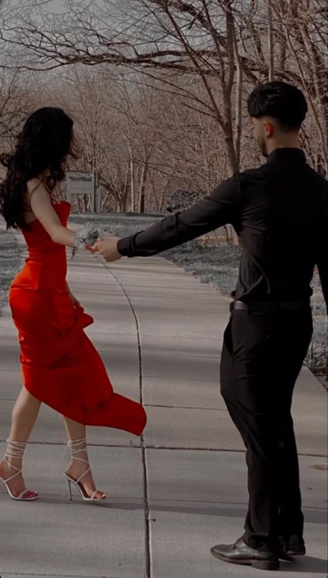 Red Black Couple Outfits, Red Dress And Black Suit Couple, Black And Red Couples Outfits, Suit And Dress Couple Outfit Elegant, Black Formal Couple Outfit, Red Dress Black Suit Couple, Red And Black Homecoming Dresses, Couple Outfits Formal, Red Prom Aesthetic