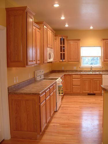 Kitchen w oak cabinets and floor 2 Orange Oak Cabinets, Oak Kitchen Cabinets Wall Color, Orange Kitchen Walls, Kabinet Dapur, Oak Kitchen Cabinets, Orange Kitchen, Oak Kitchen, Modern Kitchen Cabinets, Dark Kitchen Cabinets