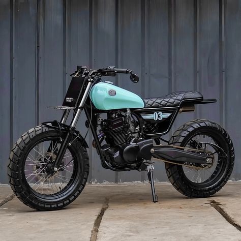 Kawasaki W175 Scrambler by @katrosgarage • Calling all custom bike enthusiasts! ️ While we don't sell motorcycles ourselves, we're passionate about showcasing incredible builds. Want to get your creation in front of our community? Send us your photos and let the world see your skills! ☝️❗ But first, check out our posting guidelines in the "Show Your Custom Bike" link in our bio. • Choose clothes and a poster with your favorite type of bike that will always be with you: Bobber, Chopper, Scra... Eletric Bike, Custom Bikes Cafe Racers, Cafe Racer Moto, Honda Scrambler, Moto Scrambler, Flat Track Motorcycle, Brat Cafe, Tracker Motorcycle, Scrambler Custom