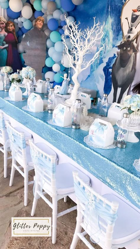 Frozen Themed Guest Table from a Frozen Birthday Party on Kara's Party Ideas | KarasPartyIdeas.com (25) Frozen Backdrop, Frozen Birthday Decorations, Frozen 3rd Birthday, Frozen Themed Birthday Cake, Frozen Birthday Party Decorations, 4de Verjaardag, Elsa Party, Elsa Birthday Party, Frozen Party Decorations