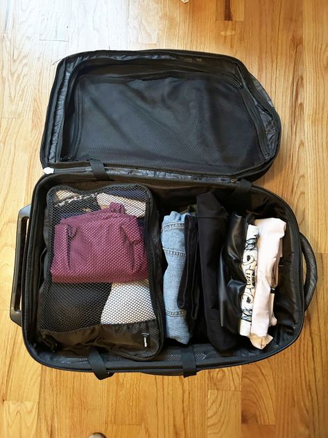 Suitcase on floor packed with rolled clothes and mesh bag Travel Baggage, Suitcase Packing Tips, Tire Pictures, Shopping Pictures, Packing Bags Travel, Apple Gift Card, Packing Clothes, Konmari Method, Army Pics