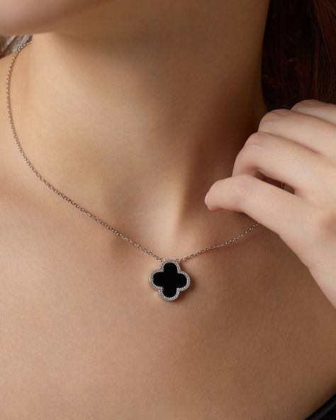 INTRODUCING Iced Flora Black Clover Pendant Necklace 🖤🍀💎✨ Enhance your style with the matching *Iced Flora Black Clover Bracelet* to complete your look! Get ready to rock this dream necklace in White Shell or Black Onyx - both are now up for grabs! 🤍🖤 All in the details: - Hand-finished - Material: 925 Sterling Silver - Finishing: Rhodium Plating - Provide the Extra Shine and Scratch-Free Exterior - Gemstone: Clear 5A Cubic Zirconia & White Shell or Black Onyx Like, comment, save and se... Dream Necklace, Clover Bracelet, Clover Pendant, Black Clover, Black Onyx, Onyx, Cubic Zirconia, Shells, 925 Sterling Silver