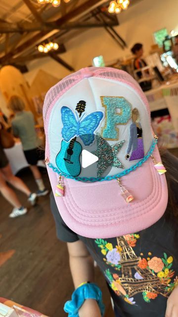 Mica May on Instagram: "Trucker Hat Bar!?
💖💯⚡️✌️😍
We are all over this trend. When we do a pop up (and WOW does @shopminimarkets know how to partay!) we want to bring something fresh and interesting each time, so you get to a see a little sampling of what we do in the studio. From a succulent bar to marble ornaments, this year we wanted something super on trend for summer.
👏
This trucker hat bar with alllllllll the patches and hat chains + charms was a FAV activation so far…and pretty sure we need to add this to our party line up. Yes?
✌️
Thx to everyone who came out to support us in the rain today, y’all are the best!!

#shopsmallbusiness #austindiystudio #truckerhats #truckerhatbar #diytruckerhat" Hat Patch Bar, Trucker Hat Party Ideas, Trucker Hat Bar Pop Up Shop, Trucker Hat Charms Diy, Trucker Hat Chains Diy, Hat Trends 2024, Iron On Trucker Hat Diy, Diy Hat Bar Party, Trucker Hat Chain Diy