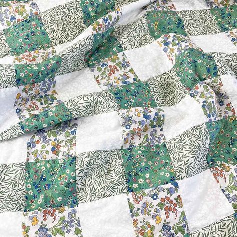 Reminiscent of the classic picnic blanket, this Green Gingham Patchwork Quilt is a great way to bring some sweet country charm to your home- Liberty style! Suitable for an adventurous beginner, construction of this quilt uses simple straight machine sewing to construct the square patchwork pieces and will introduce different quilting methods which will help advance your skills. Patchwork quilting may turn out to be easier than you first think!  Liberty Tana Lawn® would be well suited for the bac Gingham Patchwork, Classic Picnic, Liberty Quilt, Quilting Methods, Square Patchwork, Fat Quarter Quilt, Plaid Quilt, Liberty Tana Lawn, Green Gingham