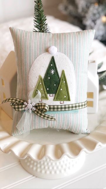 12K views · 1.1K likes | Eilene Johnson on Instagram: "Take any felt ornament pattern in my shop and turn it into a mini pillow! Just applique the felt shapes onto any size pillow you choose. Perfect for bowl fillers, tiered trays and fill ins for shelf decor ✨🙌🏻 . Winter Snow Globe pattern for sale in my Etsy shop. . #simplyeilene #applique #feltornaments #minipillow #tieredtraydecor #christmasproject #christmastreedecorating" Winter Snow Globe, Christmas Pillows Diy, Felt Shapes, Felt Ornaments Patterns, Christmas Tree Pillow, Felt Ornament, Ornament Pattern, Christmas Cushions, Christmas Pillows