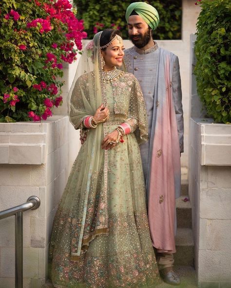 So damn gorgeous sage green lehenga with intricately detailed work and a cape style blouse! #indian #bride #lehenga #green #latest भारतीय दुल्हन संबंधी, Pastel Lehenga, Sabyasachi Lehenga, Bride And Groom Outfit, Designer Bridal Lehenga, Green Lehenga, Unique Bride, Indian Bridal Dress, Indian Bride And Groom