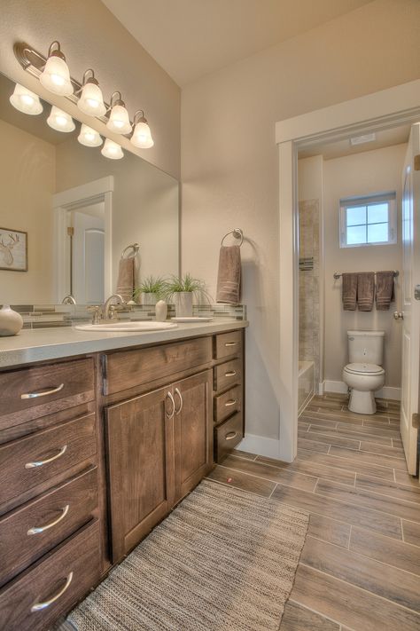 Bathroom Flooring With Wood Vanity, Bathroom Vanity With Wood Floor, Wood Vanity With Wood Floor, Natural Wood Master Bath, Bathrooms With Brown Floors, Brown Bathroom Flooring, Brown Flooring Bathroom, Natural Color Bathroom Ideas, Natural Wood Bathroom Vanity Tile Floor