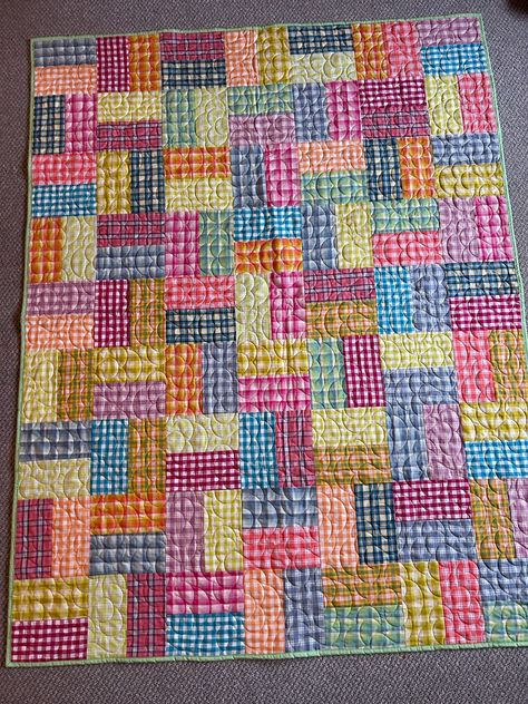 All my Plaids Quilt Bright collection of plaids, many colors. Perfect to brighten any room. Will fit Twin size bed. Quilted in a swirling flowery petal pattern. Backing is a surprise of big and bright green flowers on a raspberry background. Dimensions are 55 by 72 inches. Please feel free to reach out with any questions! Quilt Rectangle Blocks, Quilts Made With Plaid Fabric, Gingham Quilts, Quilt Backing Ideas, Green Patchwork Quilt, Raspberry Background, Pink Scrap Quilt, Pink And Purple Quilts, Red Pink And Green Quilted Throw