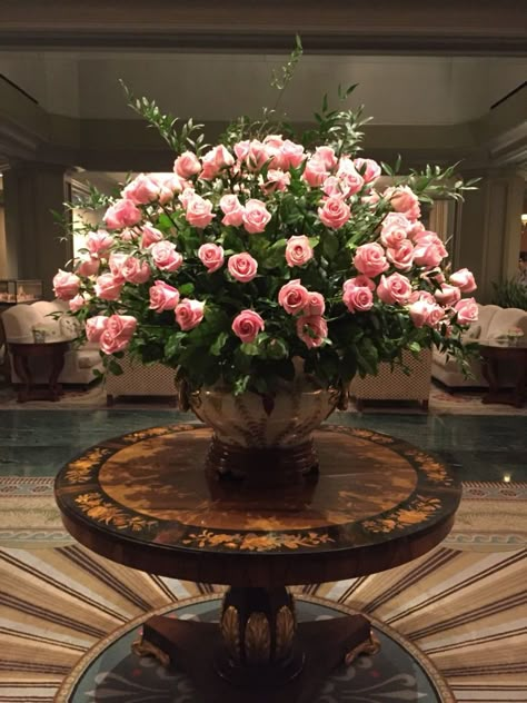 Stunning arrangement of pink roses. Hotel Flower Arrangements, Hotel Flowers, Rose Flower Arrangements, Large Floral Arrangements, Altar Flowers, Large Flower Arrangements, Flower Arrangement Designs, Church Flower Arrangements, Church Flowers