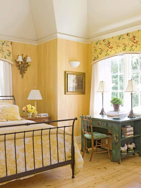 Butterscotch yellow is the focus color of this beautiful bedroom, but I just love the little green desk that adds some interest! Bedroom With Yellow Walls, French Country Decorating Bedroom, Yellow Bedroom Decor, Yellow Cottage, French Country Bedrooms, Yellow Room, Casa Vintage, Traditional Bedroom Decor, Yellow Bedroom