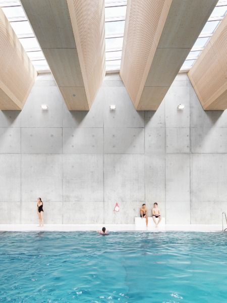 The public swimming pool in Romont includes a music conservatory and sport facilities. Daylight penetrates the building from the top with 282 skylights with different shapes from #VeluxCommercial and provides a friendly, summery atmosphere in the two main pools, resembling being outdoors. / Architect: GNWA / Photo: Rasmus Norlander
Visit @veluxcommercial and explore more of our inspiring case studies