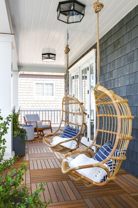 Pair of Rattan Chair Swings on Porch Farmhouse Porch Swings, Brandon Architects, Porch Swing Plans, Porch Design Ideas, Modern Coastal Home, Porch Chairs, Hanging Chairs, Swing Chair Outdoor, Building Company